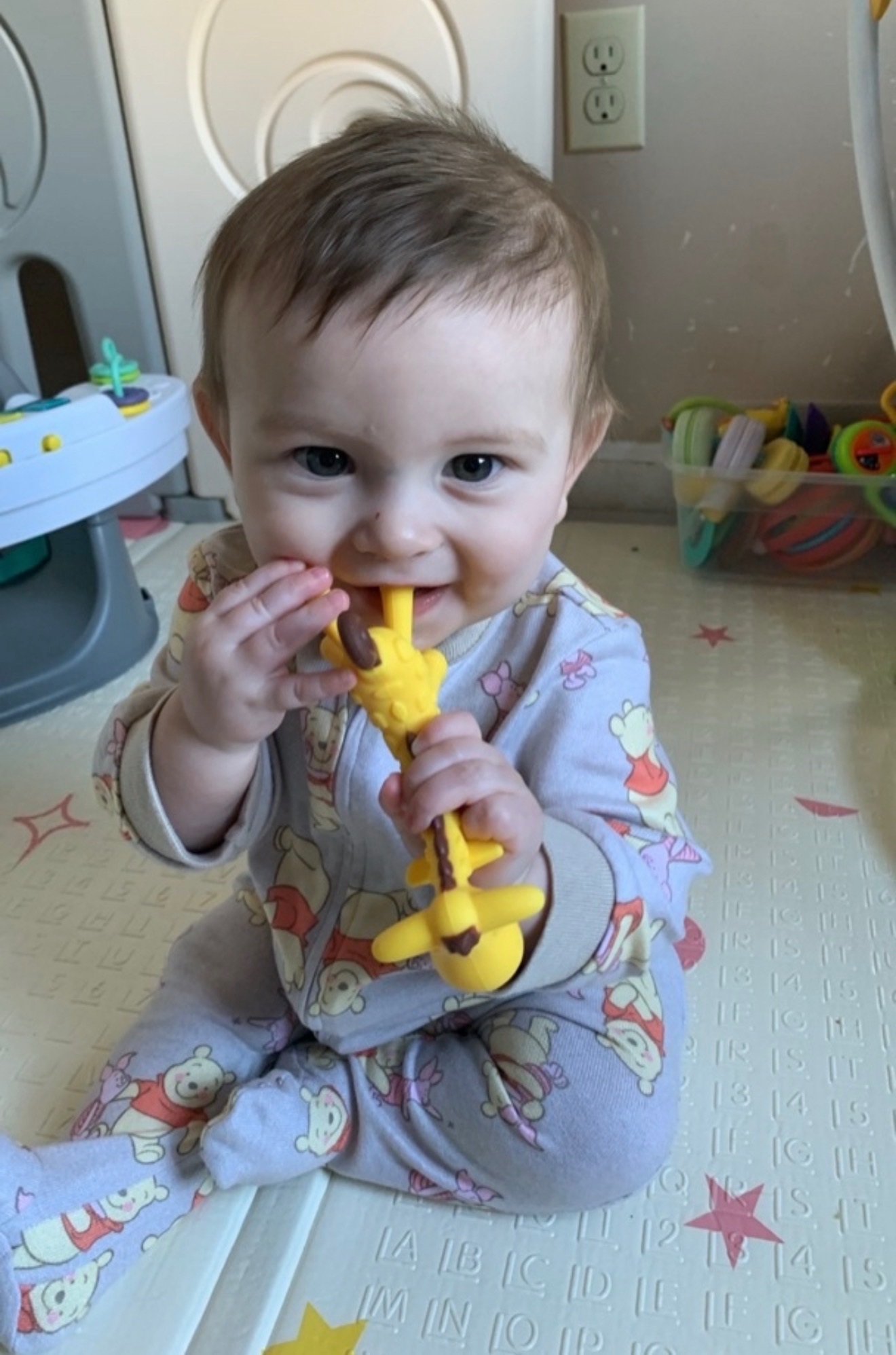 Infant playing safely in the classroom at The Learning Tree