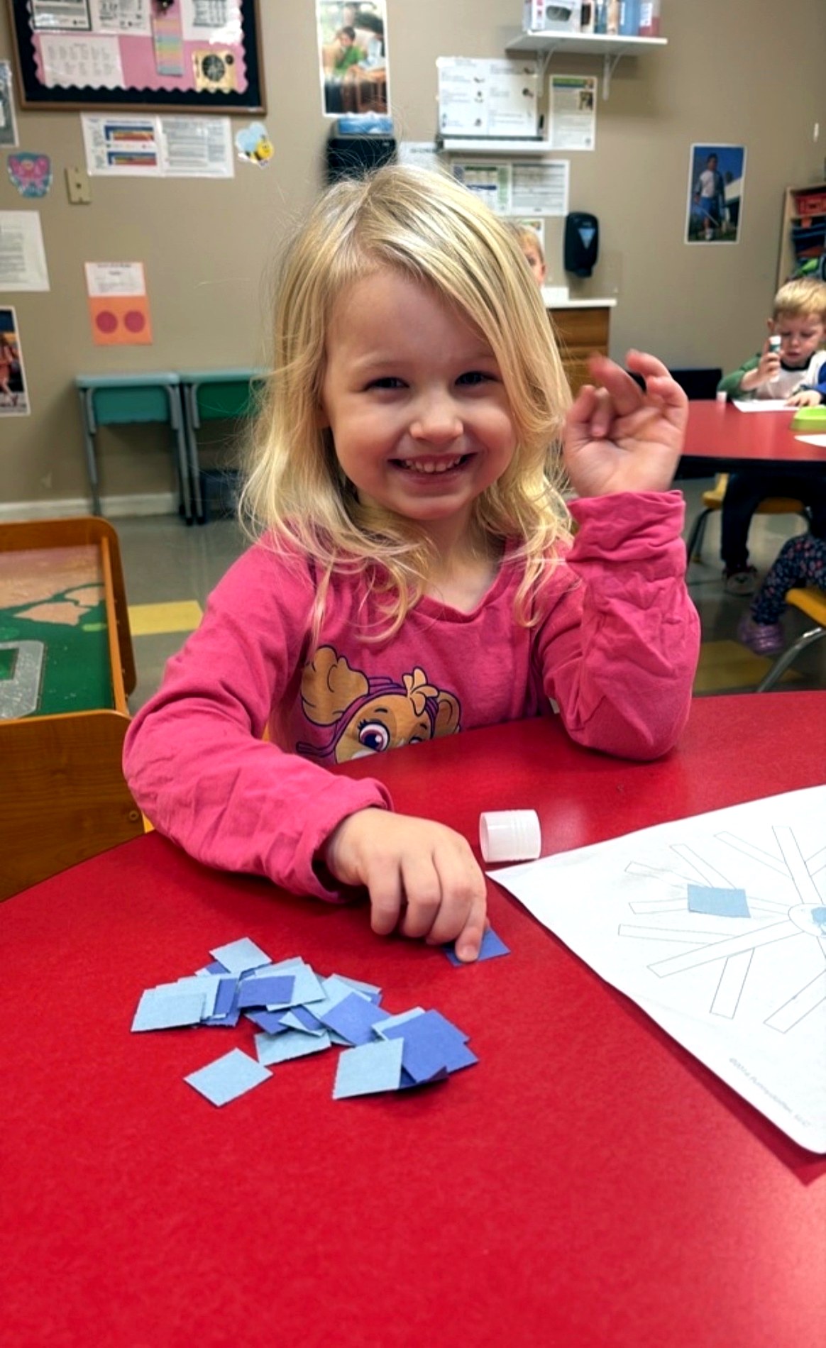 Preschool children doing an art activity at The Learning Tree